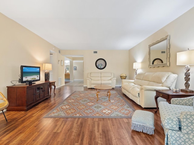 living room with dark wood-type flooring