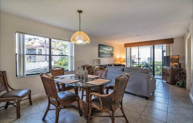 dining room featuring light tile flooring