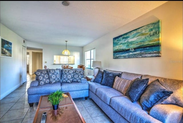 living room featuring light tile flooring