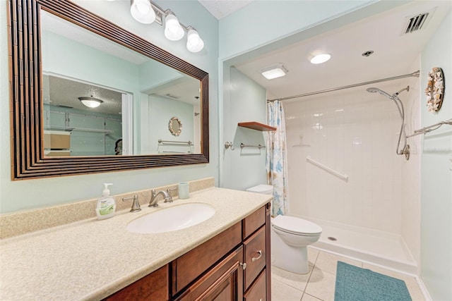 bathroom with a shower with curtain, a textured ceiling, tile floors, toilet, and vanity