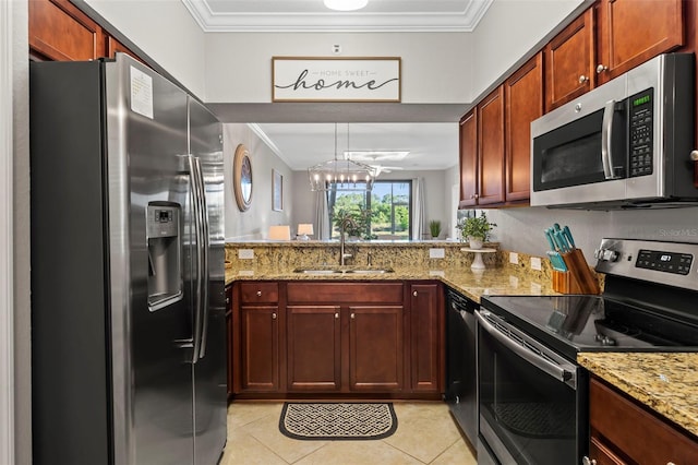 kitchen featuring ornamental molding, stainless steel appliances, sink, and light stone counters