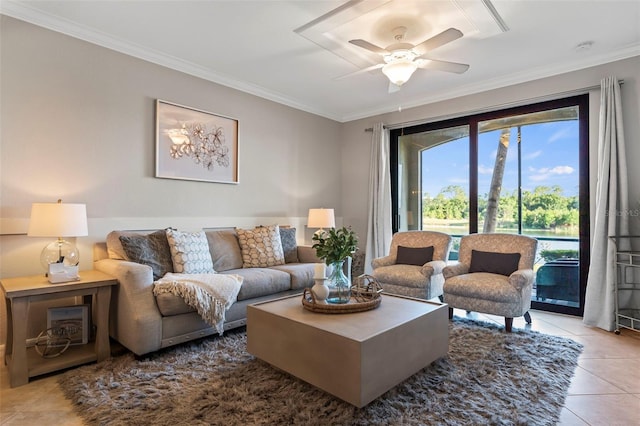 tiled living room featuring crown molding and ceiling fan