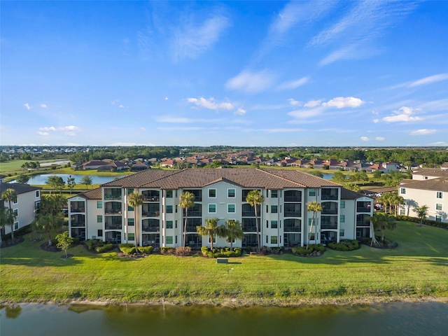 view of building exterior featuring a water view