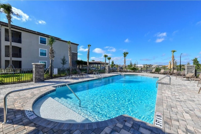 view of pool featuring a patio