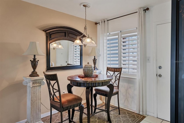 dining room with light tile floors