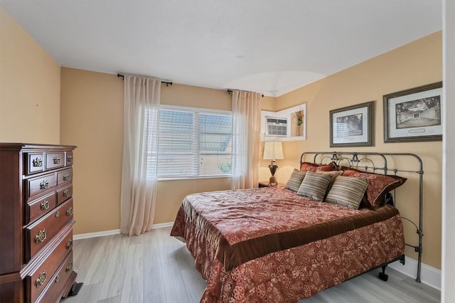 bedroom featuring light hardwood / wood-style flooring