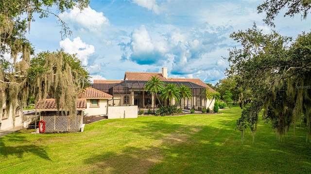 view of yard with a lanai