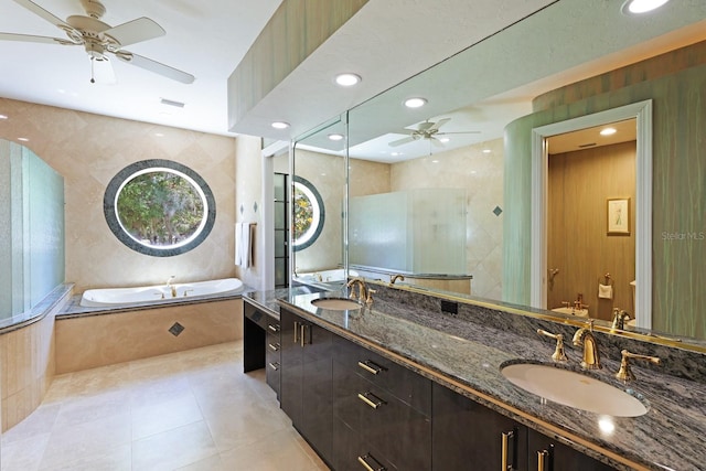 full bath featuring double vanity, tile patterned flooring, visible vents, and a sink