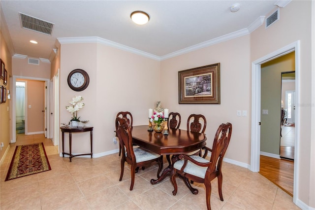 tiled dining area with ornamental molding