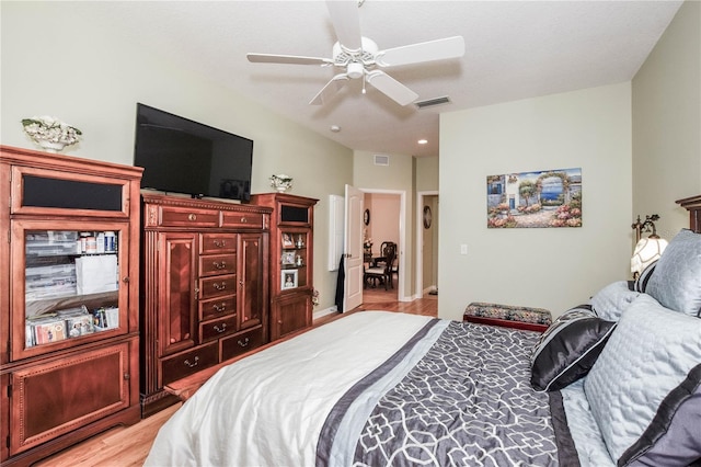 bedroom featuring light hardwood / wood-style flooring and ceiling fan