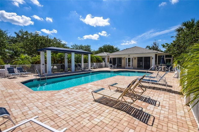 view of pool featuring a patio