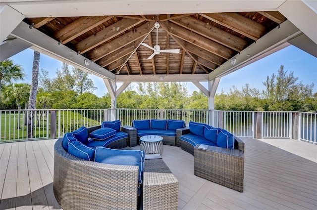 deck with an outdoor living space, a gazebo, and ceiling fan