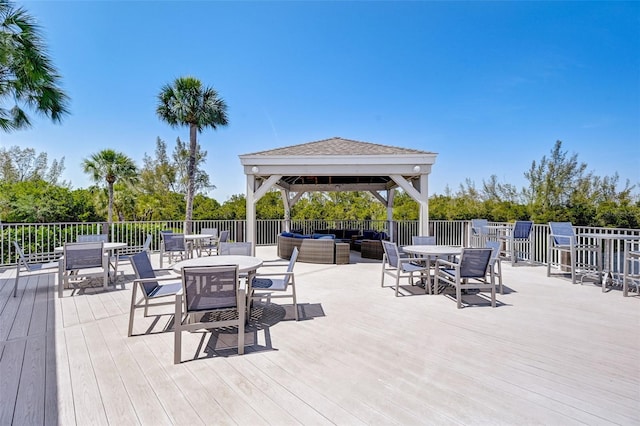 wooden deck with a gazebo