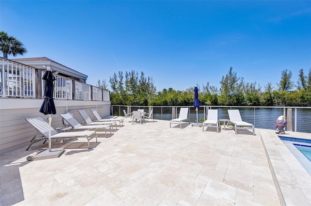 view of patio / terrace with a water view