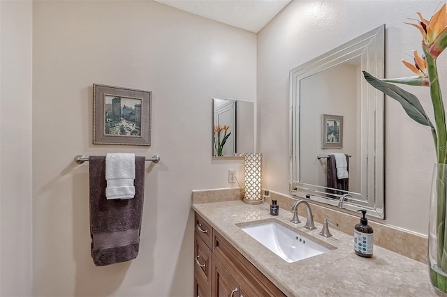 bathroom featuring oversized vanity