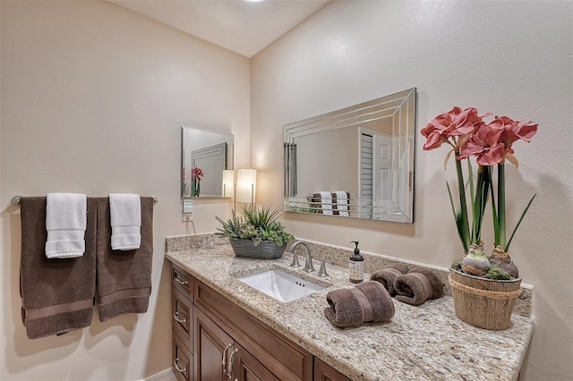 bathroom featuring oversized vanity