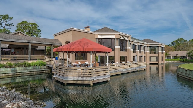 dock area with a water view