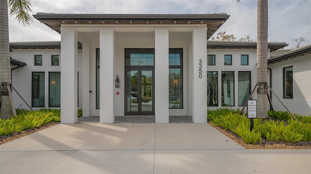 doorway to property featuring french doors