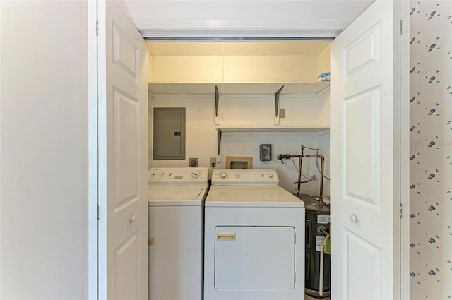 laundry area with electric dryer hookup, hookup for a washing machine, and washing machine and clothes dryer