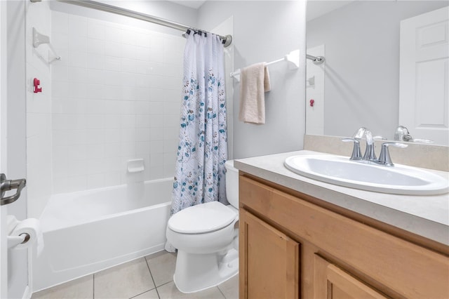 full bathroom featuring tile flooring, large vanity, toilet, and shower / bath combo with shower curtain