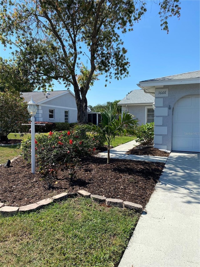 view of yard featuring a garage