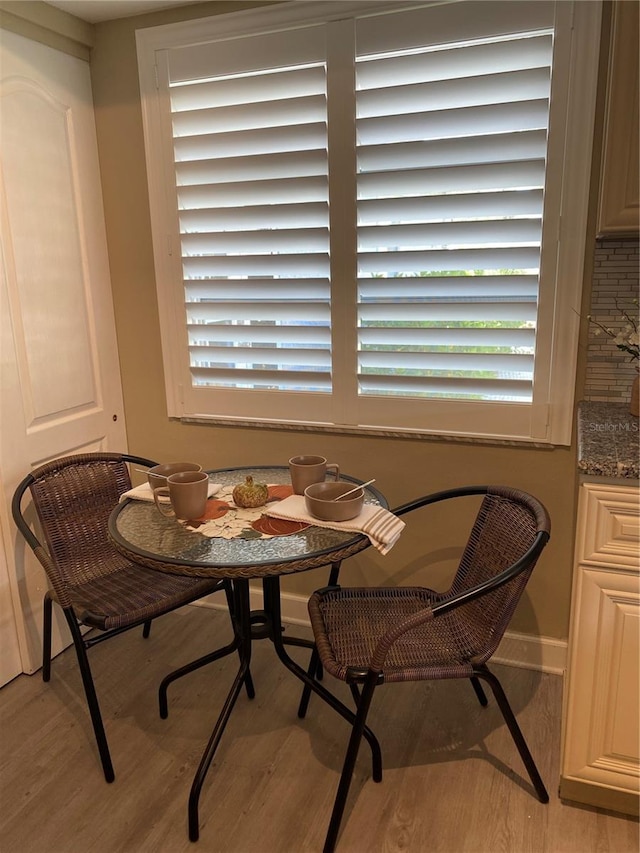 dining room with light wood-type flooring