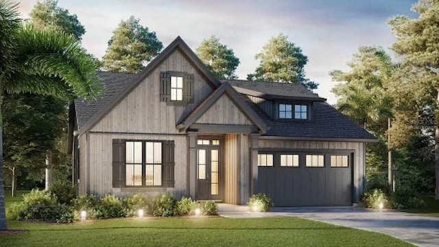 view of front of home featuring concrete driveway, a garage, a front lawn, and a shingled roof