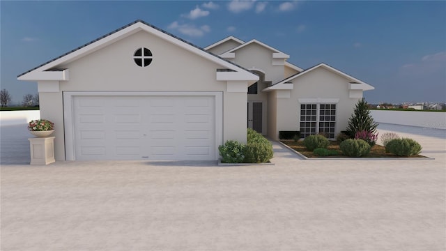 single story home with an attached garage, driveway, and stucco siding