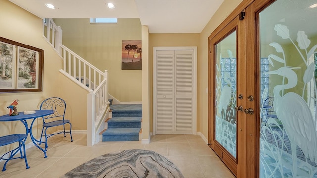 tiled foyer with french doors