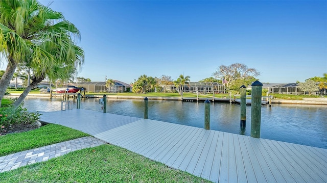 view of dock featuring a lanai and a water view