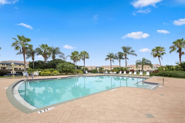 view of swimming pool featuring a patio