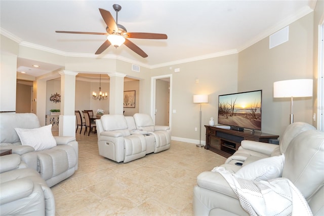 tiled living room featuring ceiling fan with notable chandelier, ornate columns, and ornamental molding