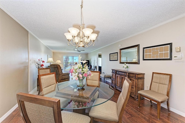 dining area featuring crown molding, dark hardwood / wood-style floors, and a chandelier