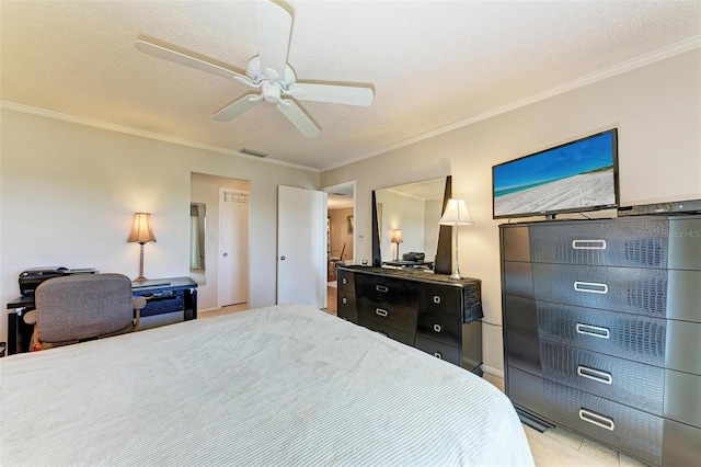 bedroom featuring crown molding, a textured ceiling, and ceiling fan