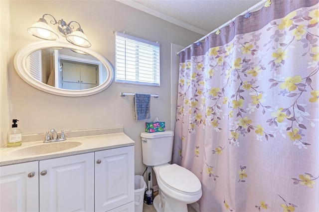 bathroom with a textured ceiling, walk in shower, toilet, ornamental molding, and vanity