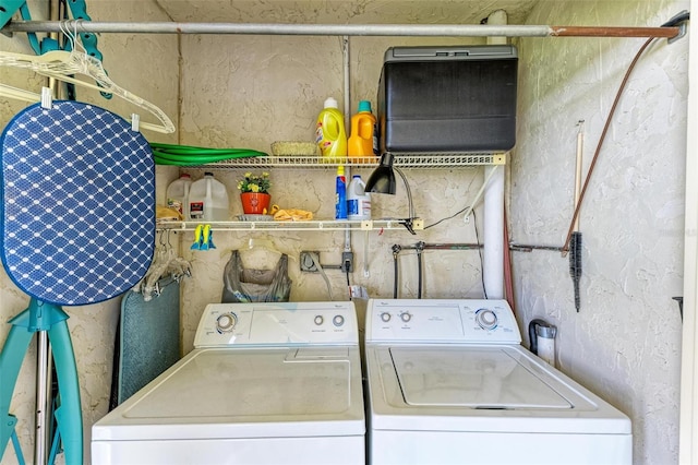 washroom with independent washer and dryer