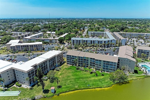 drone / aerial view with a water view