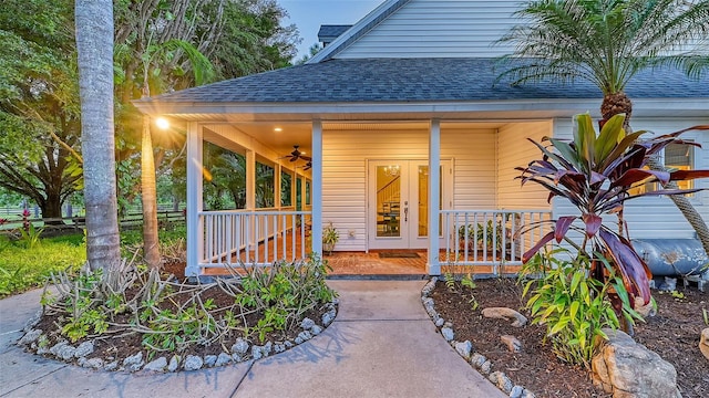 view of exterior entry with covered porch