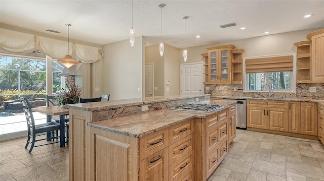 kitchen featuring a kitchen island, tasteful backsplash, light stone counters, pendant lighting, and light tile floors