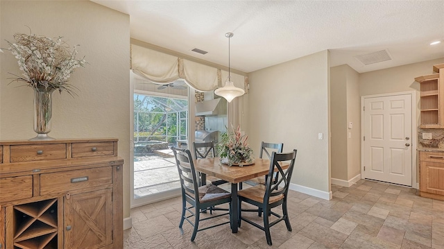 view of tiled dining space