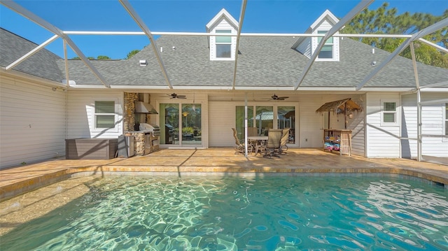 view of swimming pool with a patio, a lanai, area for grilling, and ceiling fan