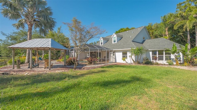 exterior space with a gazebo and a front lawn