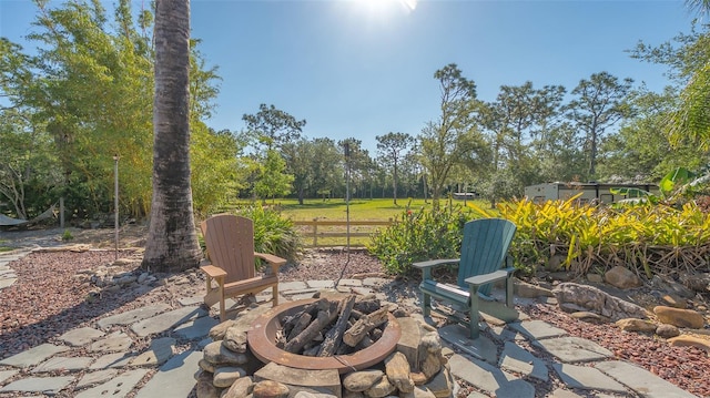 view of patio with an outdoor fire pit