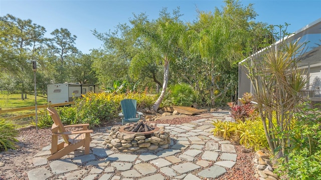 view of patio featuring an outdoor fire pit