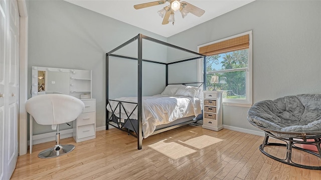 bedroom featuring ceiling fan and light wood-type flooring