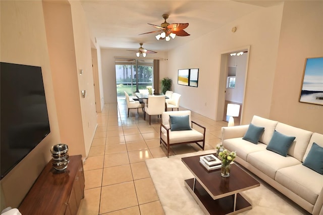 tiled living room featuring ceiling fan