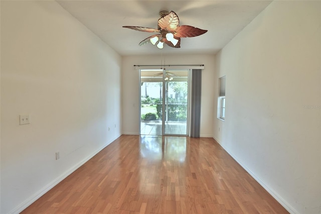 spare room with ceiling fan and light hardwood / wood-style flooring