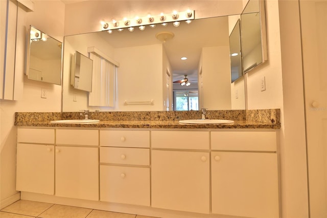 bathroom with tile patterned floors, ceiling fan, and vanity