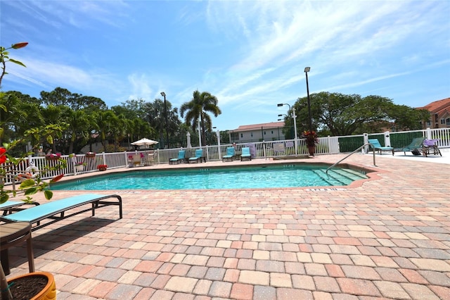 view of pool featuring a patio area