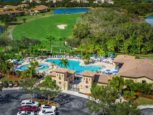 view of pool with a water view